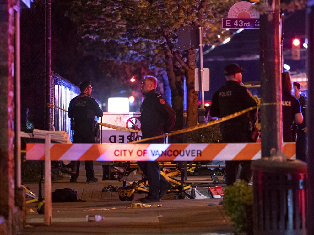 Vancouver police secure the scene after a car drove into a crowd at the Lapu Lapu Festival in Vancouver, British Columbia on Saturday.