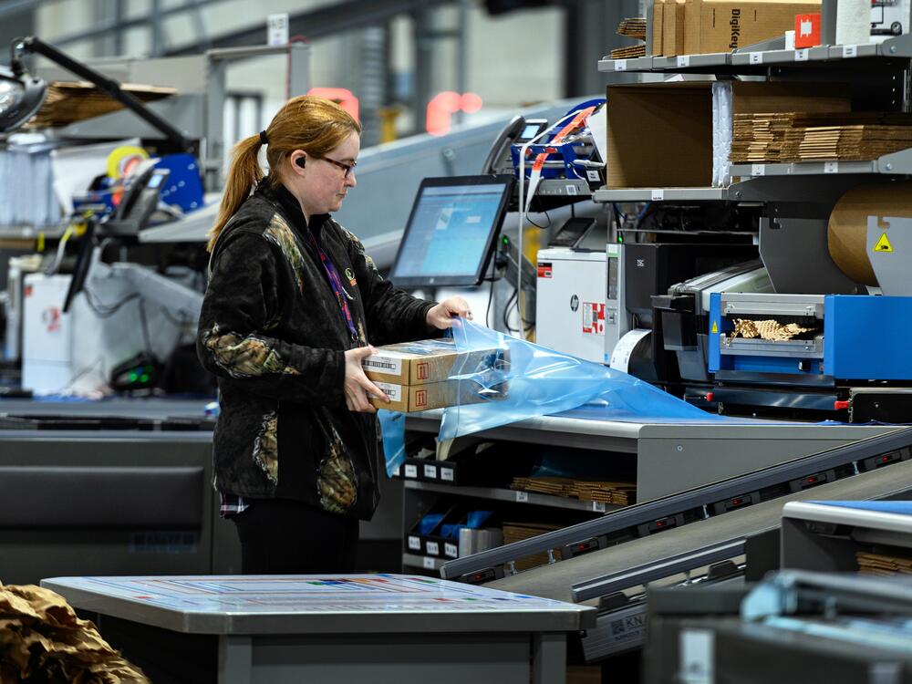 A DigiKey worker packs an order at the company's warehouse, which operates a foreign trade zone that allows some imports to be stored as if they hadn't entered U.S. soil.