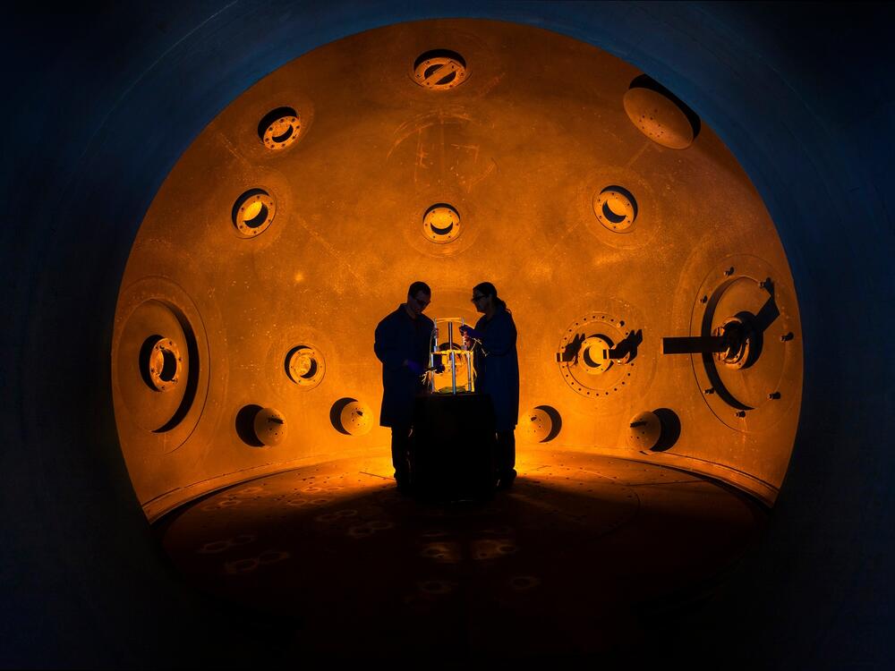 Workers stand inside a special chamber at Lawrence Livermore National Laboratory. The chamber is used to test new conventional explosives that initiate detonation of advanced nuclear weapons designs. The data produced from such experiments is considered restricted.