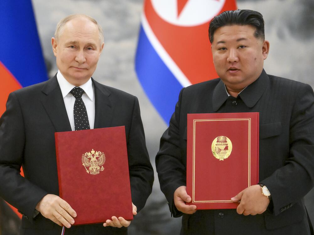 Russian President Vladimir Putin, left, and North Korea's leader Kim Jong Un pose for a photo during a signing ceremony of a new partnership in Pyongyang, North Korea in June, 2024.