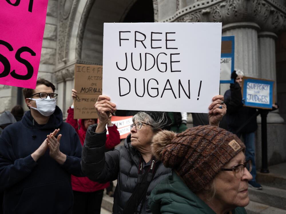 Demonstrators protest in front of the federal courthouse where Milwaukee County Circuit Judge Hannah Dugan appeared in front of a judge after being arrested by the FBI as she arrived for work this morning at the Milwaukee County Courthouse on April 25 in Milwaukee, Wisc.