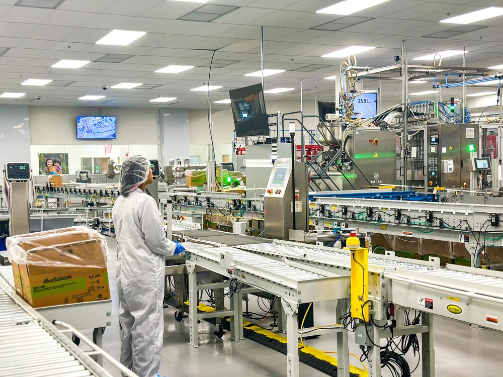 A production line at Edesia Nutrition's Rhode Island factory. Usually it's jam-packed with boxes of Plumpy'Nut but the company has cut back because it's owed $20 million by the U.S. government.