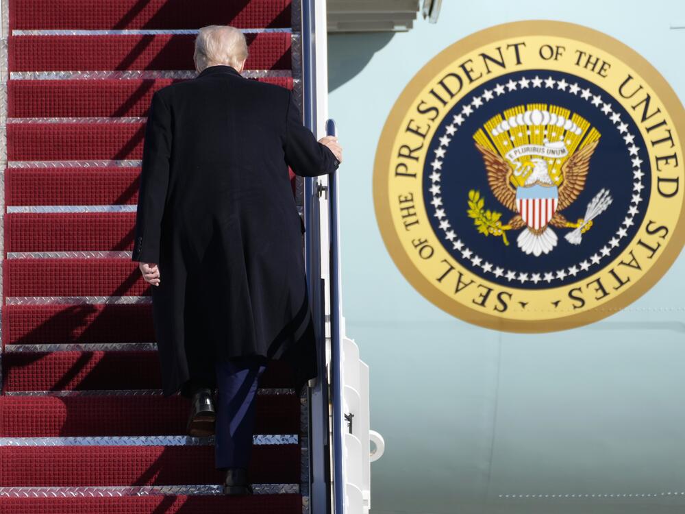President Trump boards Air Force One in February. He hits the 100-day mark of his presidency this week.