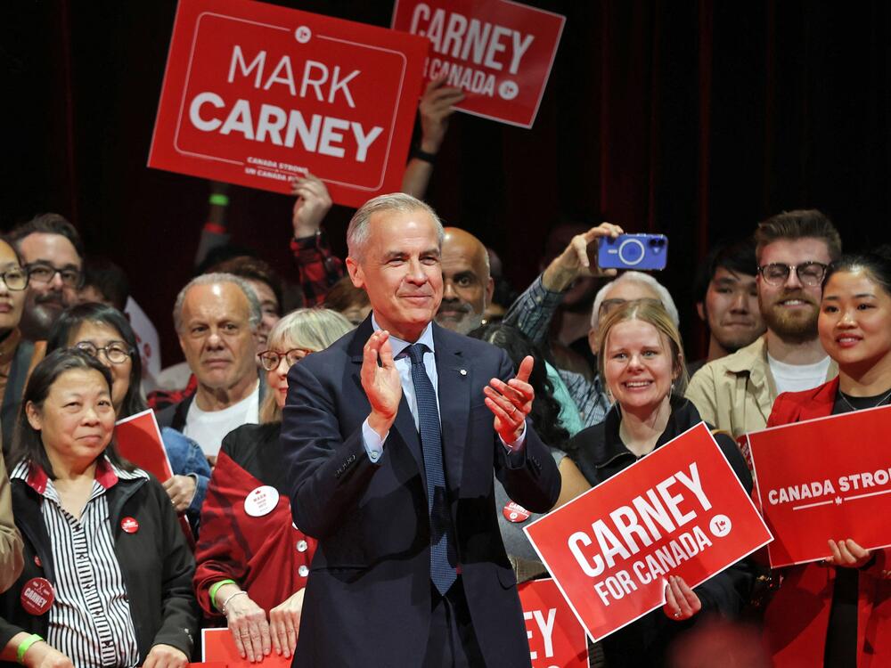 Canada's Prime Minister and Liberal Party leader Mark Carney applauds at a victory party in Ottawa, Ontario on April 29, 2025.