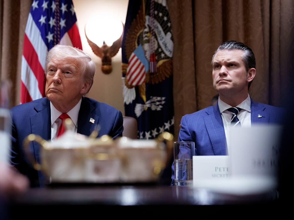 President Trump and Defense Secretary Pete Hegseth appear during a Cabinet meeting at the White House on Feb. 26.