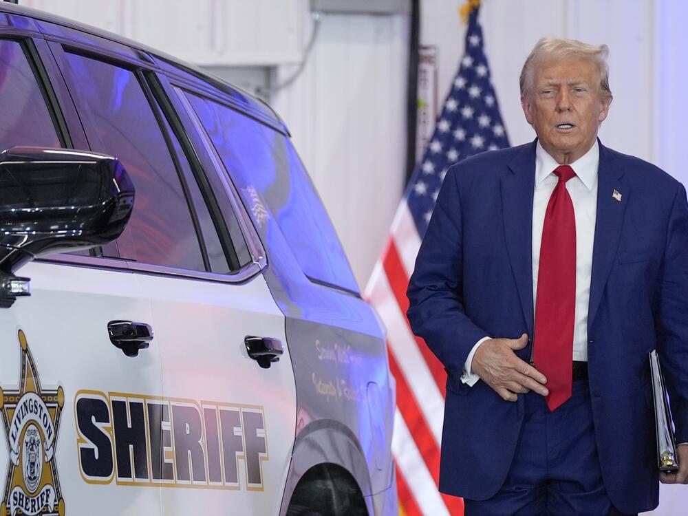 President Donald Trump arrives to speak on crime and safety during a campaign event at the Livingston County Sheriff's Office Aug. 20, 2024, in Howell, Mich. (AP Photo/Evan Vucci)