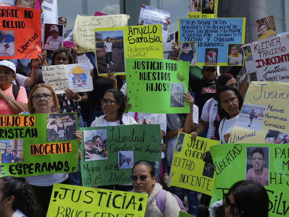 The relatives of Venezuelan migrants in the U.S. who were flown to a prison in El Salvador by the U.S. government protest outside the United Nations building in Caracas, Venezuela, in April. President Trump invoked the 18th-century Alien Enemies Act to deport the men without due process — one of several ways he is attempting to deliver on campaign promises to 