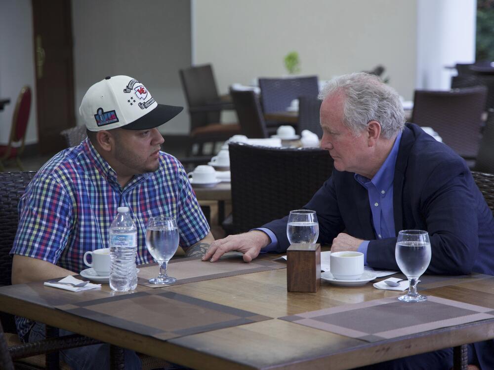Sen. Chris Van Hollen of Maryland (right) traveled to El Salvador to meet with Kilmar Abrego Garcia, a Salvadoran citizen living in Maryland who was mistakenly deported to El Salvador by the Trump administration. Abrego Garcia had not been seen since his arrest and deportation nearly one month earlier.