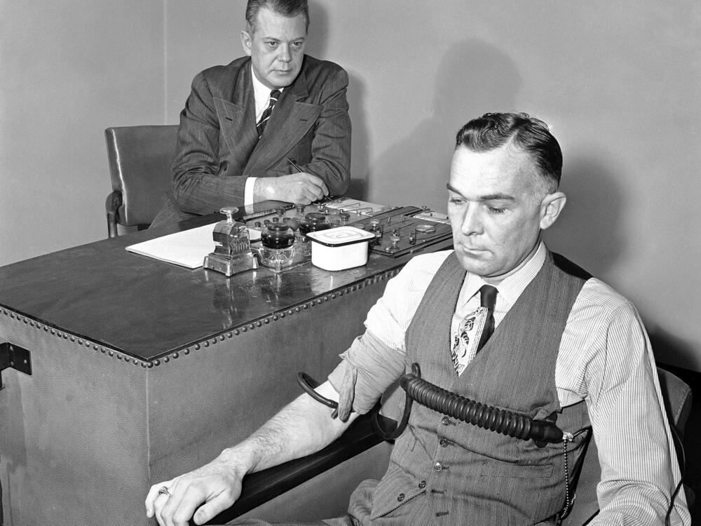 Leonarde Keeler, who refined and considered a co-inventor of the modern polygraph, administers a polygraph test on April 13, 1948.