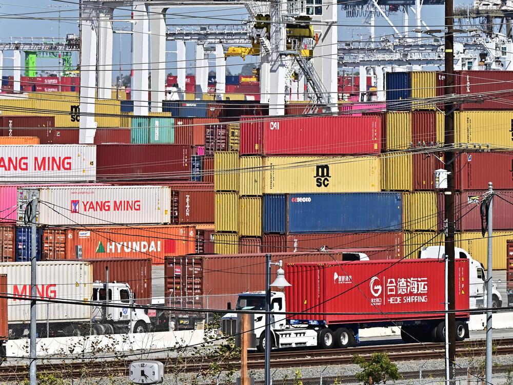 Shipping containers are stacked high at the Port of Long Beach in California on March 4.