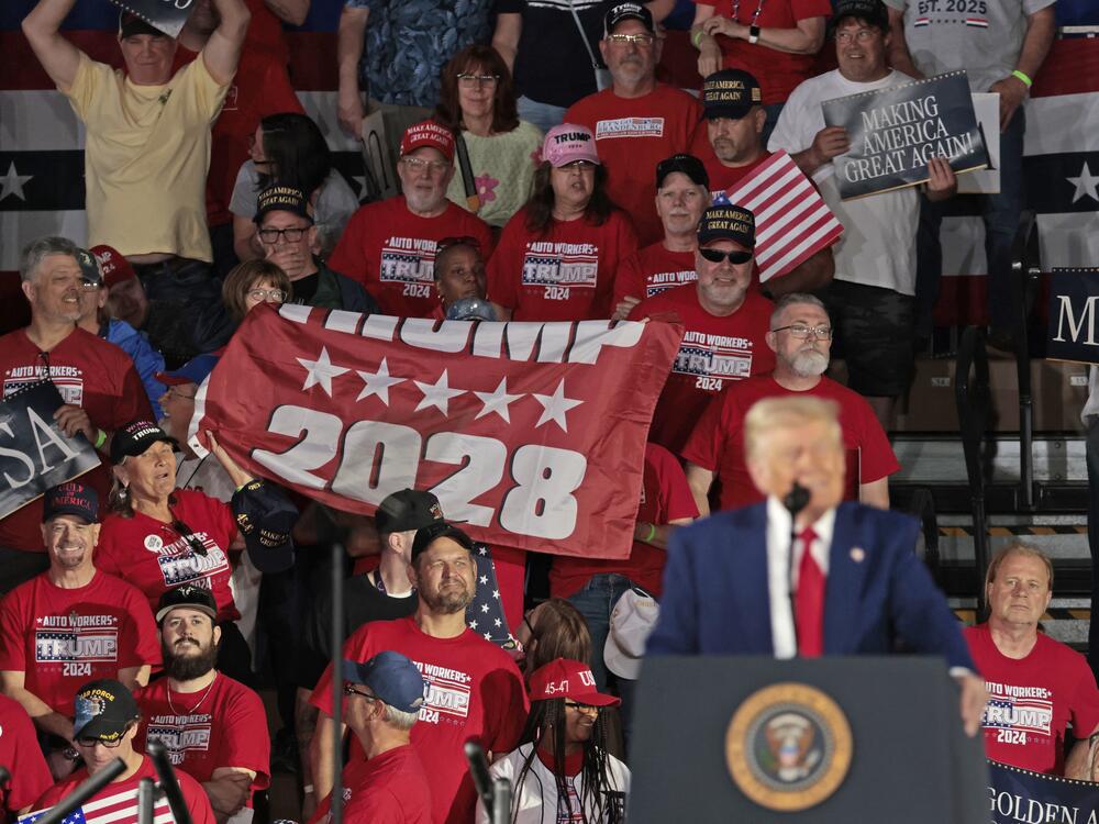 Auto Workers for Trump held up a Trump 2028 banner as Trump delivered his remarks.