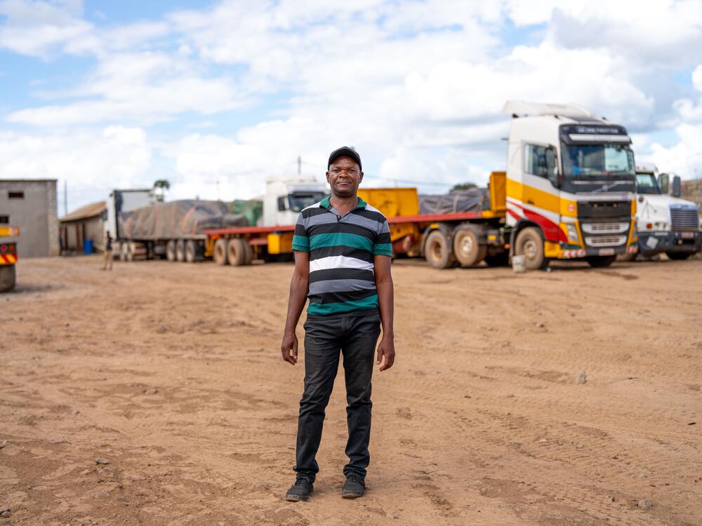 Community health worker Geoffrey Chanda used to distribute HIV medications to long-haul truck drivers and sex workers at truck stops like this one near the border of Zambia and the Democratic Republic of Congo.