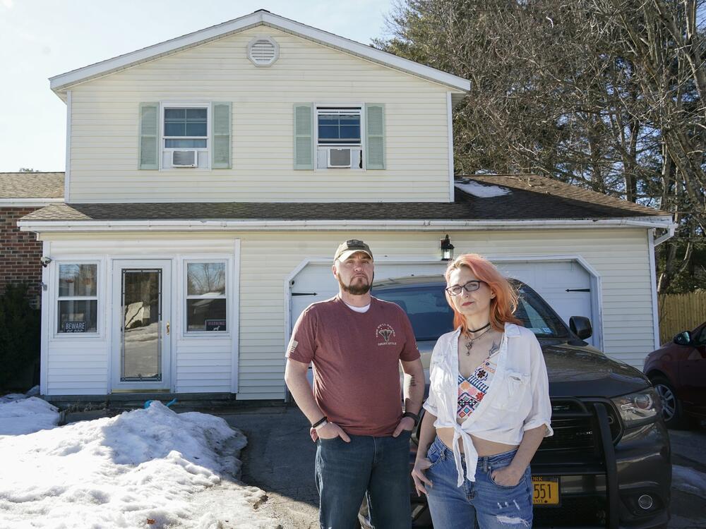 Kevin Conlon and his wife, Jenny, at their home in upstate New York. The couple have owned the house for 12 years and don't know where they would go if they lose it.