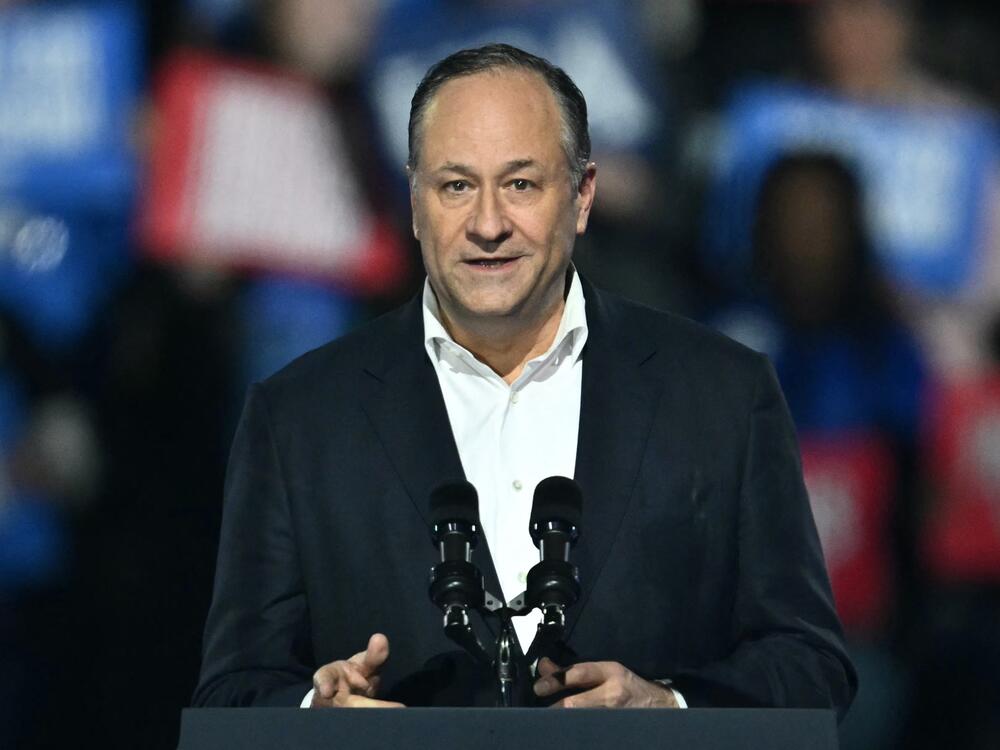 Former second gentleman Doug Emhoff, speaking at a rally in November, was among the Biden appointees the Trump administration removed from the U.S. Holocaust Memorial Museum's board of trustees.