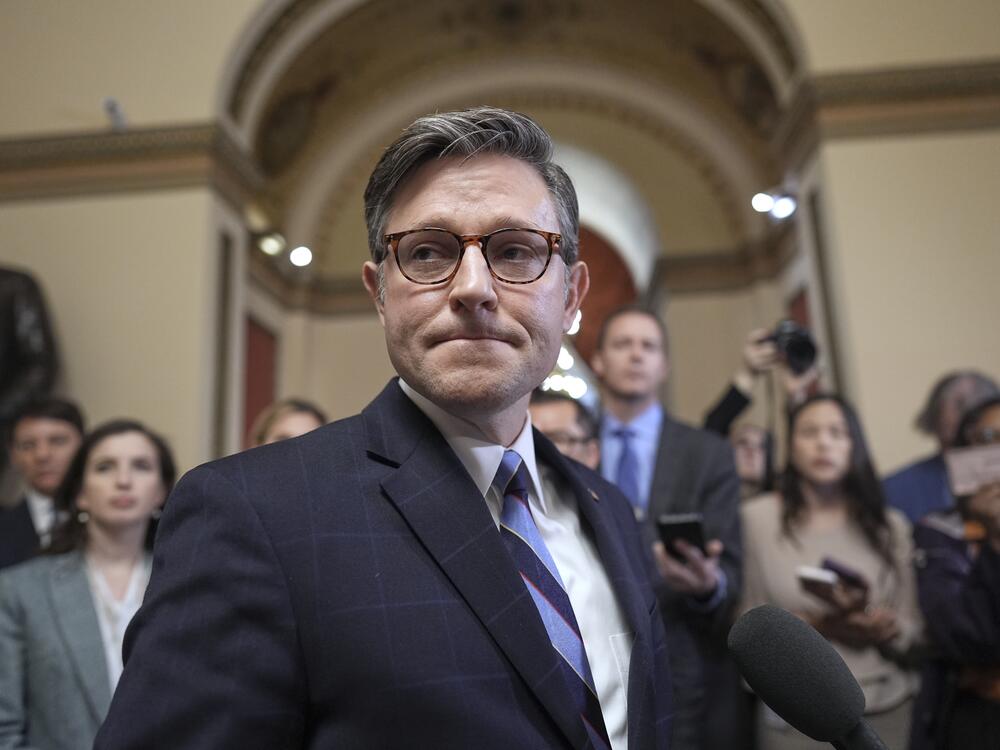 Speaker of the House Mike Johnson, R-La., talks to reporters just after House Republicans narrowly approved their budget framework, at the Capitol in Washington, Thursday, April 10.
