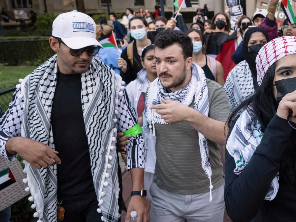 Mohsen Mahdawi (left) and Mahmoud Khalil participate in a pro-Palestinian protest at Columbia University in New York City on Oct. 12, 2023.