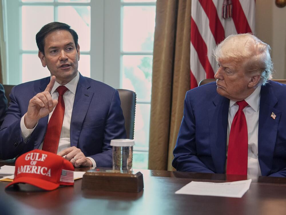 Secretary of State Marco Rubio speaks during a cabinet meeting at the White House, Wednesday, April 30, in Washington, as President Donald Trump look on.