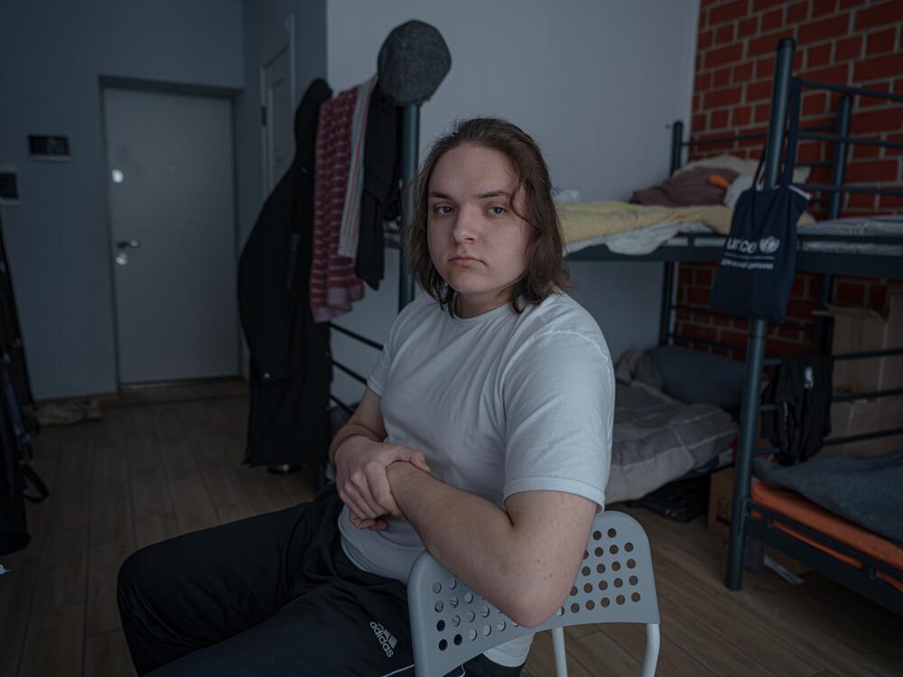 Ivan Sarancha sits in his room in a dormitory, where other Ukrainians displaced by the war are staying, set up by the charity Save Ukraine, in Gatne, Kyiv region.