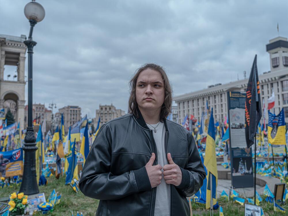 Ivan Sarancha, 18, who left Luhansk after 11 years of living under occupation, stands in front of a memorial for the fallen at Maidan Square — where the pro-Europe uprising known as the 