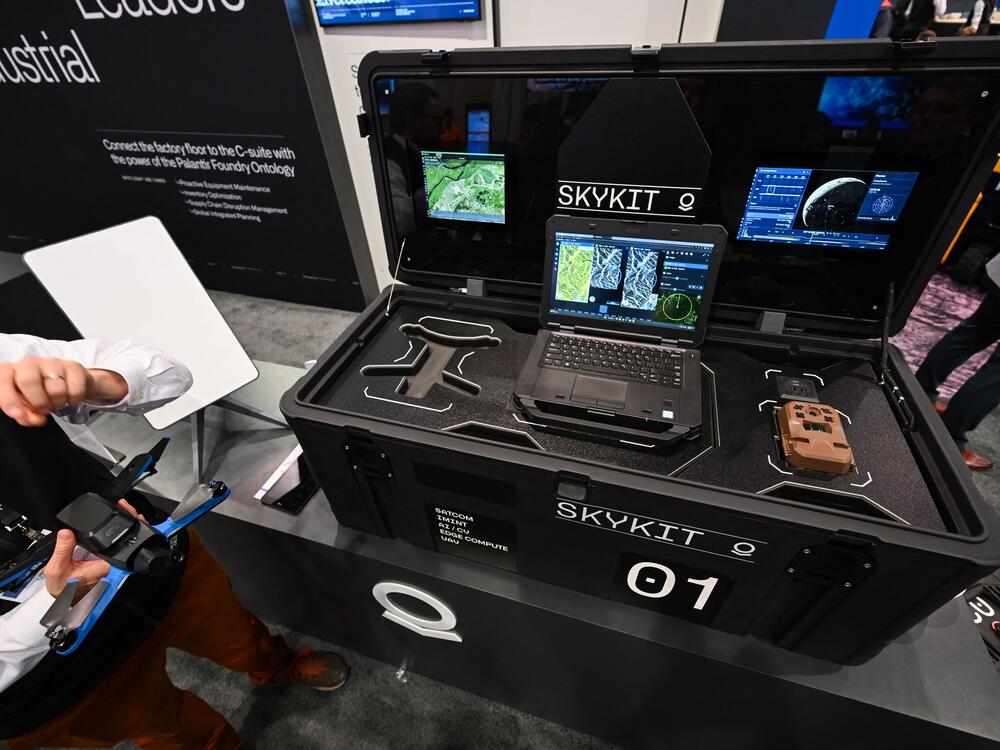 A Palantir Skykit is displayed at the company's booth during the CES trade show in Las Vegas on Jan. 5, 2023. The Skykit incorporates Palantir's software, along with a UAV drone, a trail camera, battery packs and a SpaceX Starlink terminal, into a self-contained defense intelligence package deployable to hostile environments.