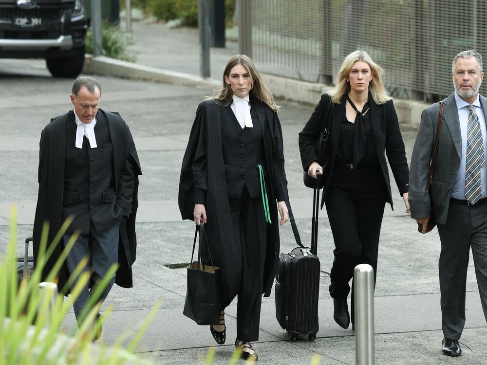 Barrister Colin Mandy SC (from left), Barrister Sophie Stafford, Lawyer Ophelia Holloway, and Lawyer Bill Doogue arrive at Latrobe Valley Magistrates' Court on Wednesday.