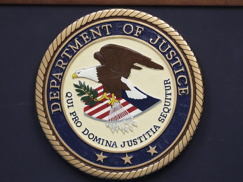 The Department of Justice seal is seen during a news conference Thursday, Dec. 5, 2024, in Memphis, Tenn.