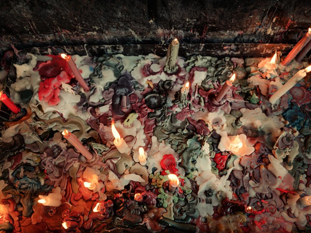 Candles are lit at Ayn Zaman shrine in Sweida, southern Syria.