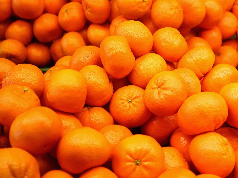 <em>Foreign Fruit</em> is a hybrid memoir that pulls apart mythologies of colonialism, inheritance and identity like the segments of a citrus fruit. Above, citrus on display at a shop in the UK.