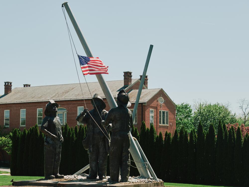 The <em>To Lift a Nation</em> statue, which honors the firefighters who responded to the 9/11 attacks, stands at the National Fire Academy in Emmitsburg. Each year, thousands come to town for a memorial weekend to honor fallen firefighters.