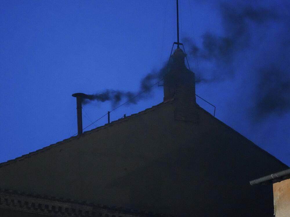 Black smoke billows from the chimney of the Sistine Chapel, where 133 cardinals are gathering on the first day of the conclave, indicating that a successor of the late Pope Francis was not elected, Wednesday.