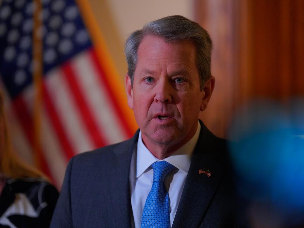 Georgia Gov. Brian Kemp speaks to the press at the Georgia State Capitol after signing a religious freedom bill into law on Friday, April 4.