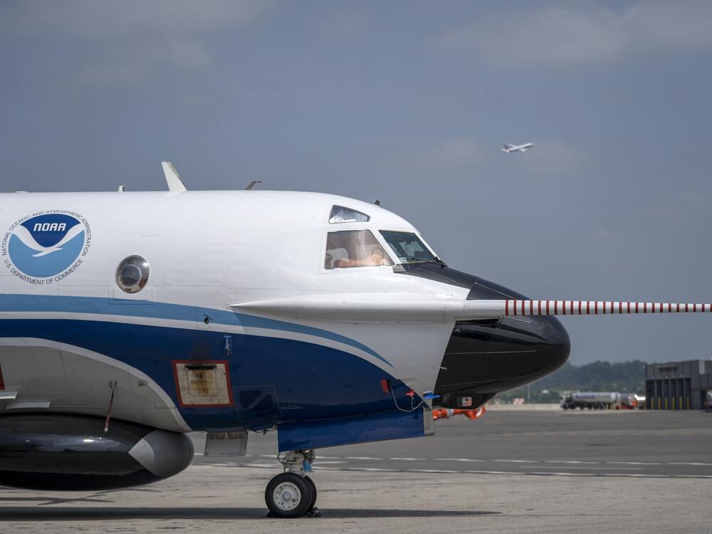 The National Oceanic and Atmospheric Administration's Orion hurricane hunter aircraft sits on the tarmac at Ronald Reagan Washington National Airport in 2022. Data gathered by the aircraft helps federal scientists issue hurricane warnings to the public.