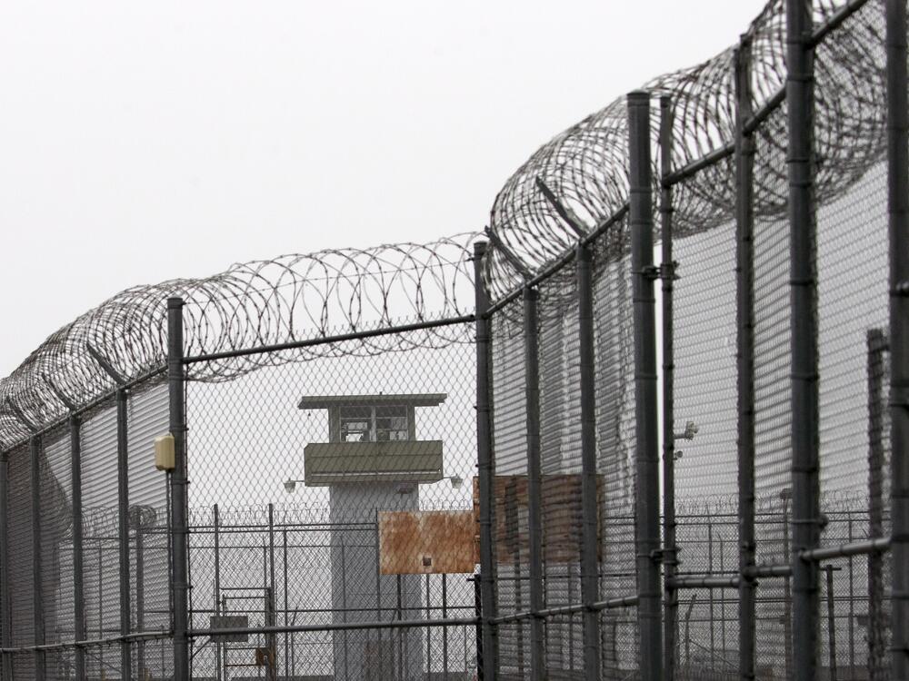 A guard tower and barbed wire fencing stand outside Sing Sing on Feb. 16, 2020, in Ossining, N.Y.