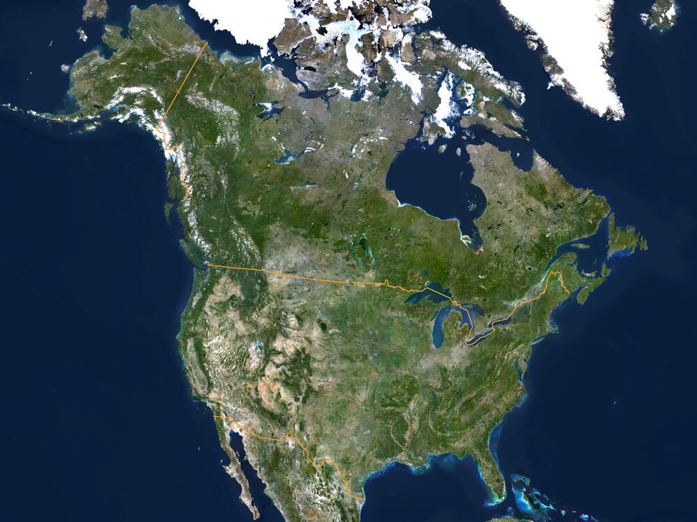 The U.S.-Canada border, as seen in this satellite map, mostly runs along the 49th parallel — and wasn't chosen at random.
