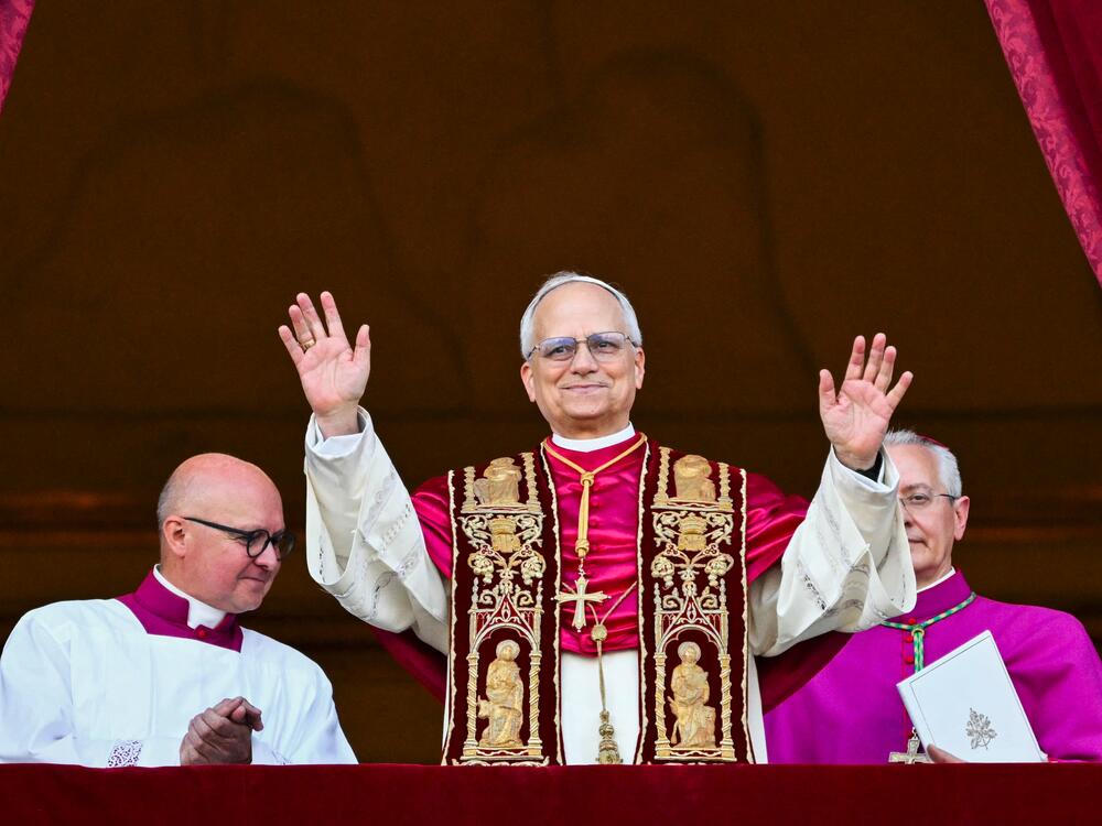 Pope Leo XIV greets followers for the first time after being elected pope.