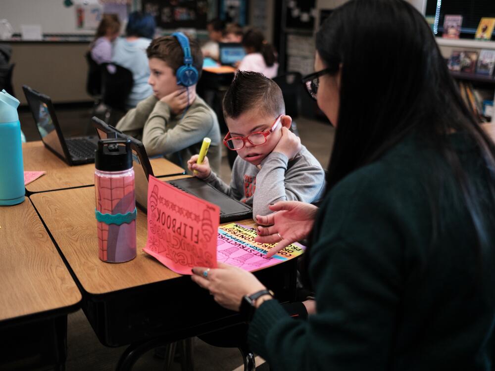 Kellen and his classmates, including his best friend, Nolan Robbins (left), learn about the structure of the U.S. government with teacher Robyn Fox.