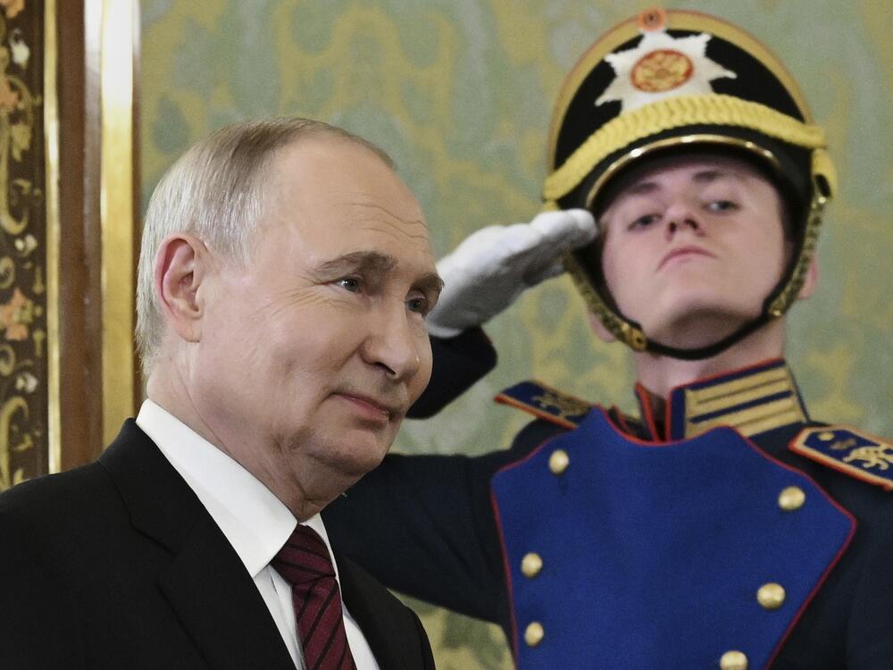 Russian President Vladimir Putin enters a hall to meet South Ossetian President Alan Gagloyev in the Grand Palace at the Kremlin in Moscow, Russia, on Saturday, May 10, 2025, during celebrations of the 80th anniversary of the Soviet Union's victory over Nazi Germany during the World War II.