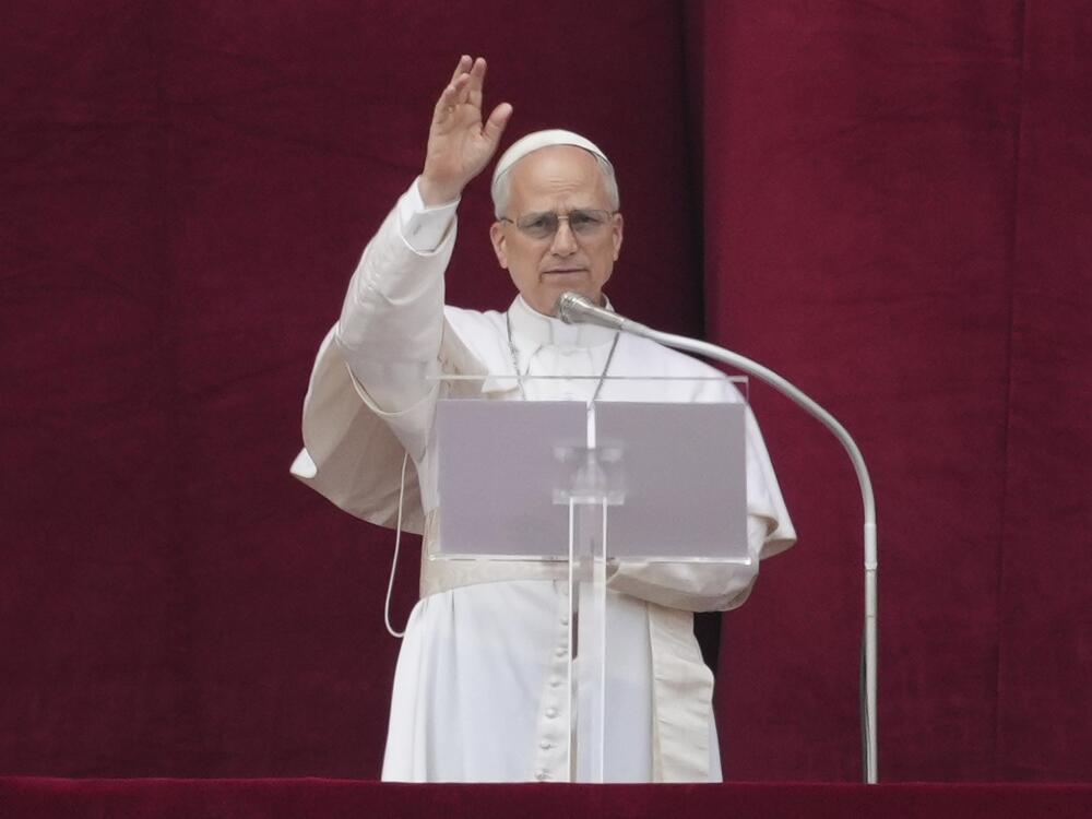 Pope Leo XIV delivers his blessing from the central balcony of St. Peter's Basilica for his first Sunday blessing after his election, in St. Peter's Square at the Vatican, Sunday, May 11, 2025.