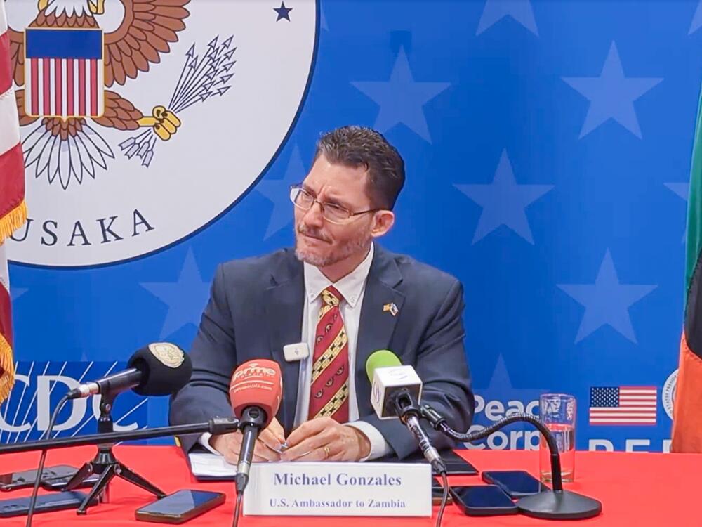 Michael Gonzales, U.S. ambassador to Zambia, at the Thursday press conference when he announced a cut of $50 million in aid for medications and medical supplies to the country. After 29 minutes, he was wiping away tears: 