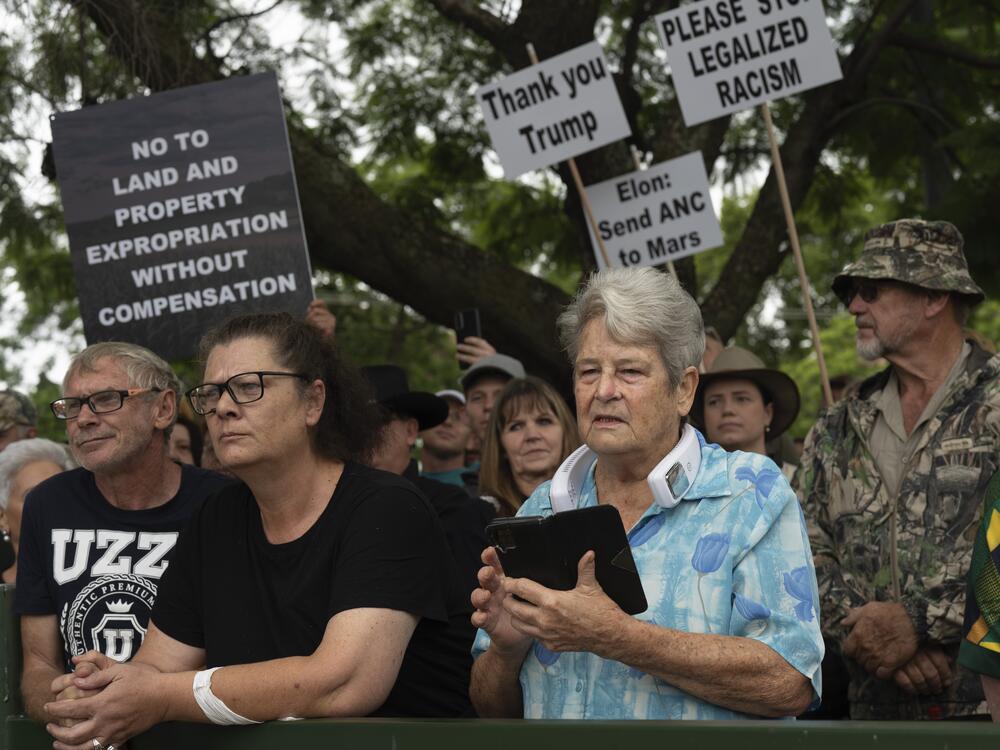 White Afrikaaner South Africans demonstrate in support of U.S. President Donald Trump in front of the U.S. embassy in Pretoria, South Africa, Feb. 15, 2025.