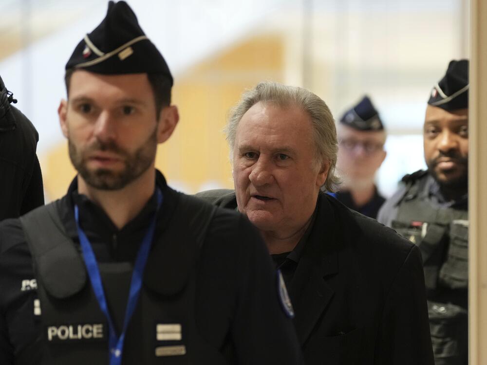 French actor Gérard Depardieu leaves for a break during his trial for the alleged sexual assaults of two women on a film set in 2021.