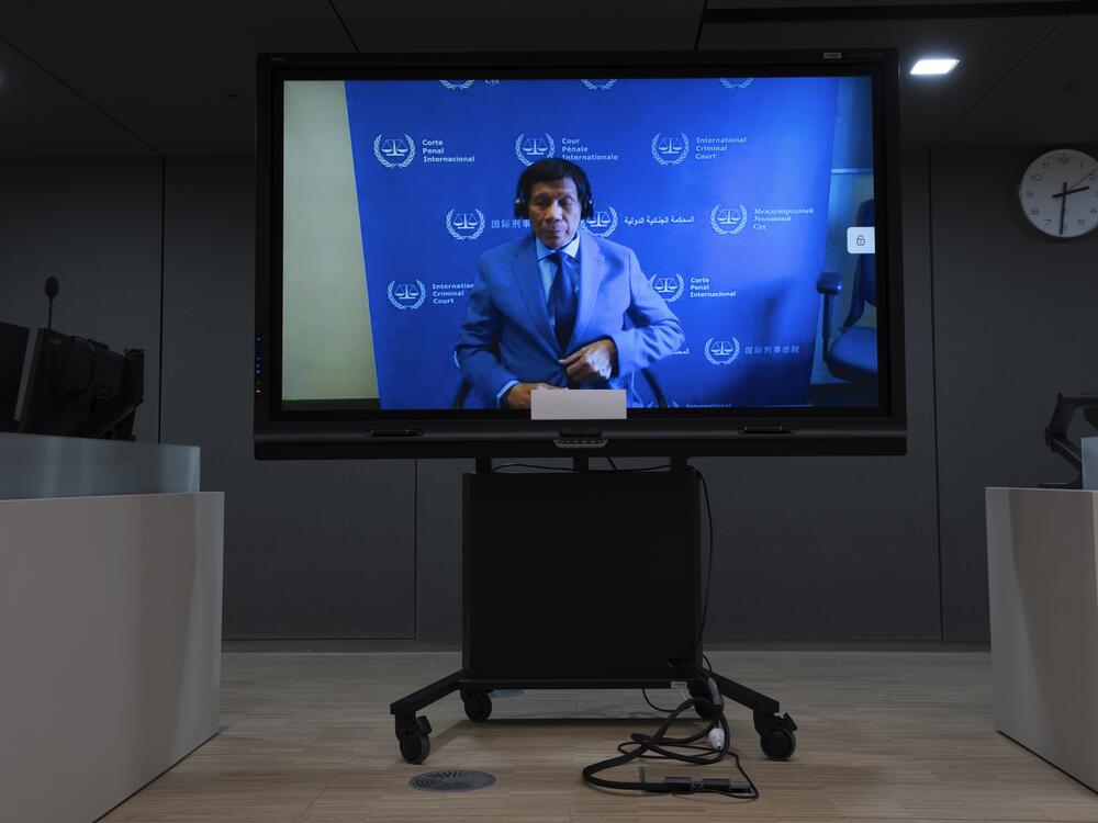 Former Philippine President Rodrigo Duterte is seen on a screen in the courtroom of the International Criminal Court (ICC) in The Hague, Netherlands, March 14, 2025.