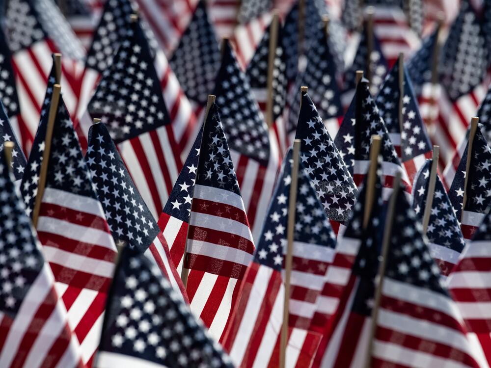 Some 37,000 US flags stand planted as part of a Memorial Day Flag Garden by the Soldiers and Sailors Monument in Boston Common on May 25, 2024.