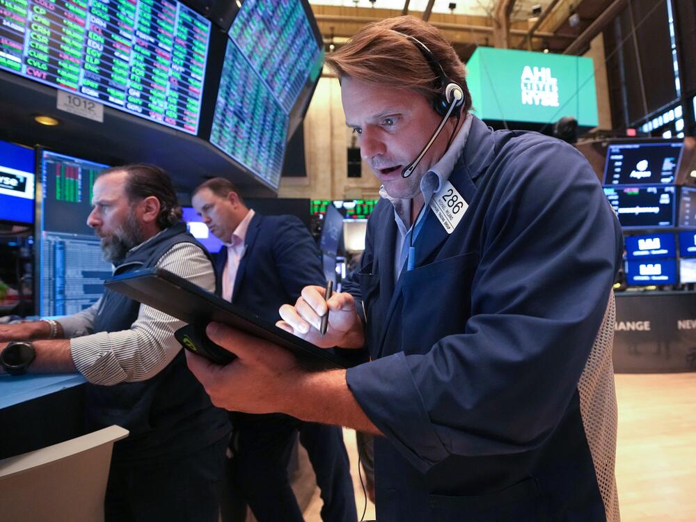 Traders work on the floor of the New York Stock Exchange at the opening bell on Thursday in New York City. Stocks surged on Monday after China and the U.S. clinched a temporary deal on tariffs.