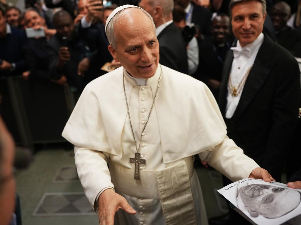 Pope Leo XIV arrives for an audience with thousands of journalists and media workers at Paul VI Audience Hall in Vatican City. The audience with journalists has become a tradition among newly elected popes.