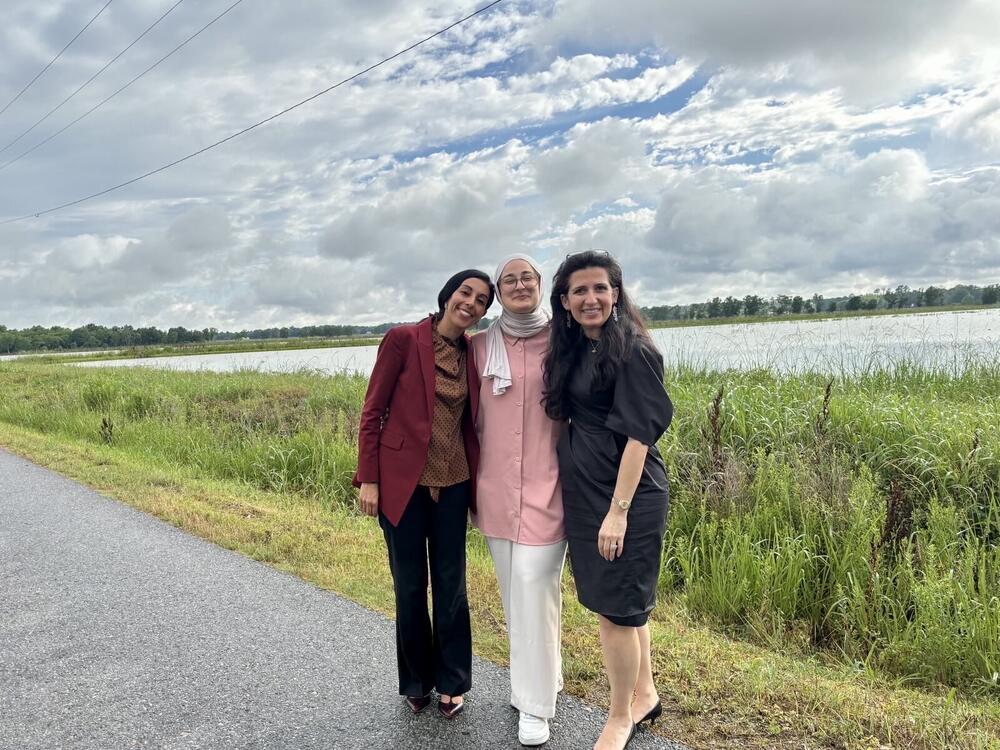 Rümeysa Öztürk (center) after being released from ICE custody Friday evening. Accompanied by Nora Ahmed, legal director of the ACLU of Louisiana (left) and  Öztürk's attorney, Mahsa Khanbabai (right).