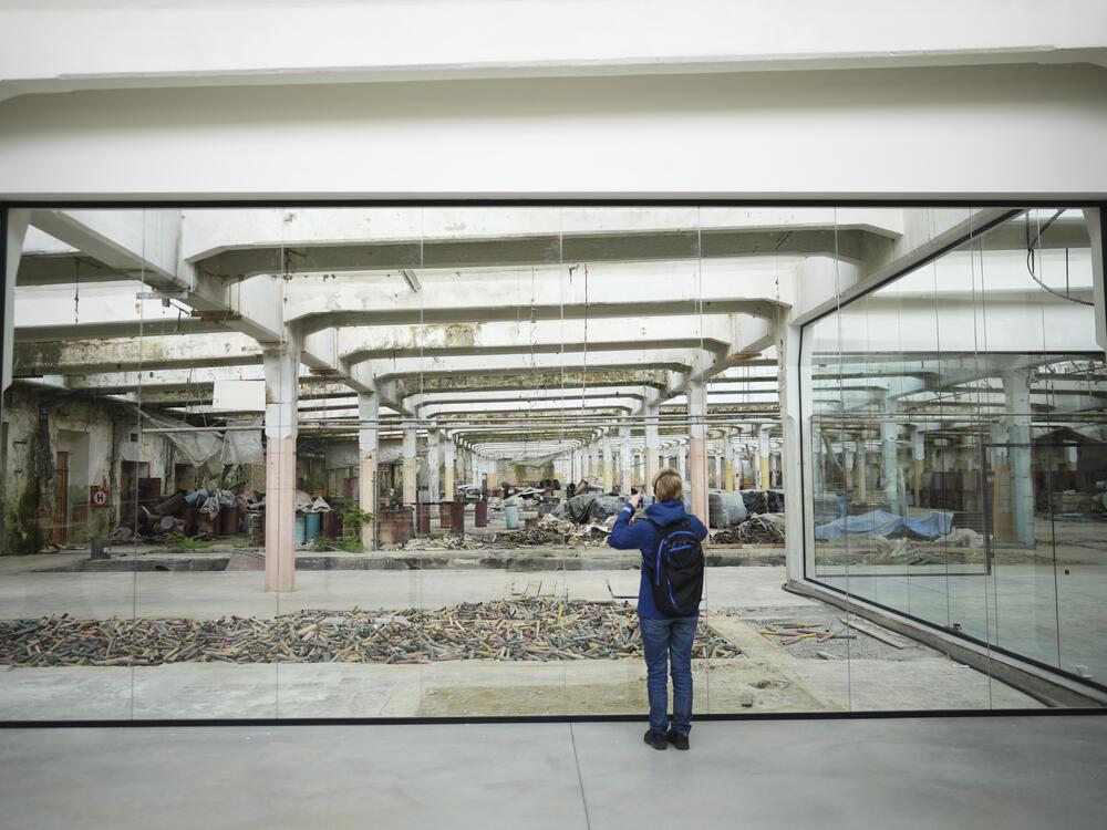 A visitor takes a photo at the Museum of Survivors, located in a factory where Oskar Schindler saved some 1200 Jews during WWII, in Brnenec, Czech Republic, on May 10.
