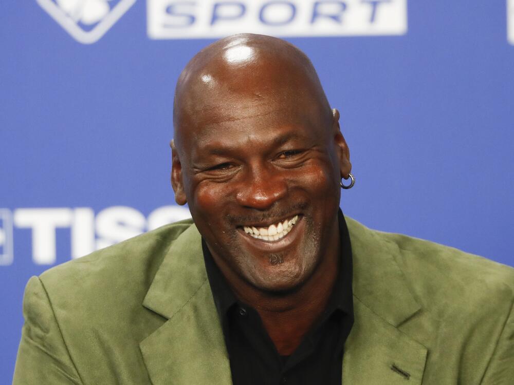 Basketball legend Michael Jordan speaks during a press conference ahead of an NBA basketball game between the Charlotte Hornets and Milwaukee Bucks in Paris, Jan. 24, 2020.
