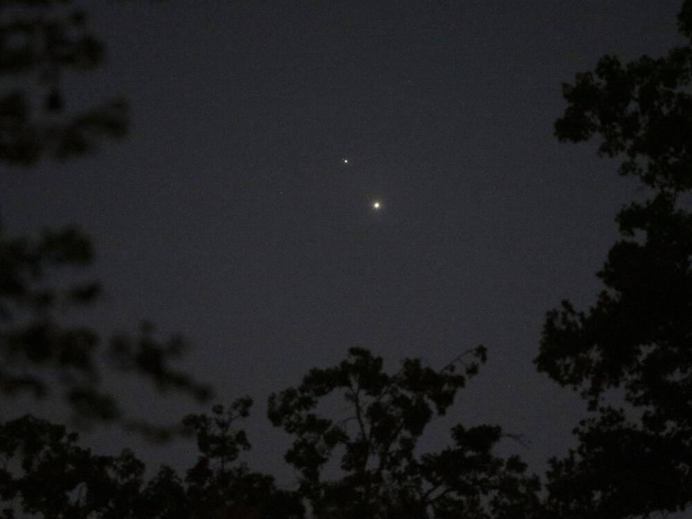 The planets Venus (bottom) and Jupiter are seen in the sky above Matthews, N.C., in 2015. A Soviet probe launched more than 50 years ago — and never reached Venus, its intended destination — likely crash landed in the Indian Ocean on Saturday.