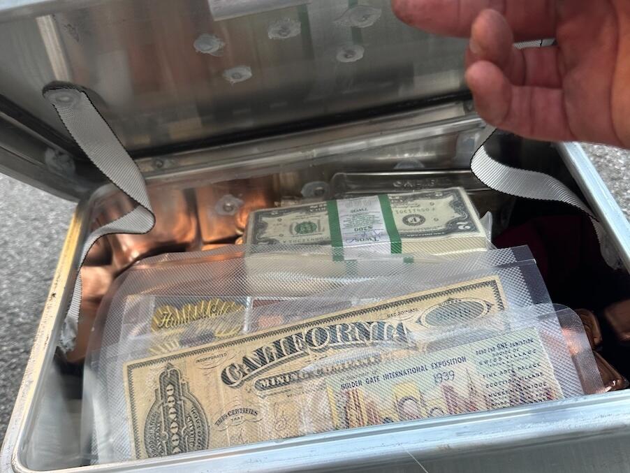 This metal box containing around $10,000 of gold, currency and historic San Francisco artifacts was found late on May 13 on West Ridge Trail in Mount Sutro Open Space Reserve, San Francisco.